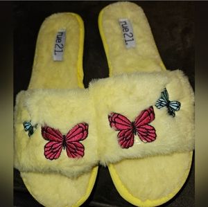 Rue21 Fuzzy slippers with butterflies with durable lug sole. Perfect for spring.